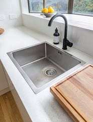 kitchen sink with garbage disposal