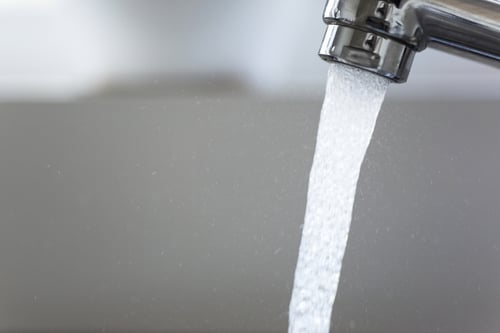 Clean water running out of a faucet