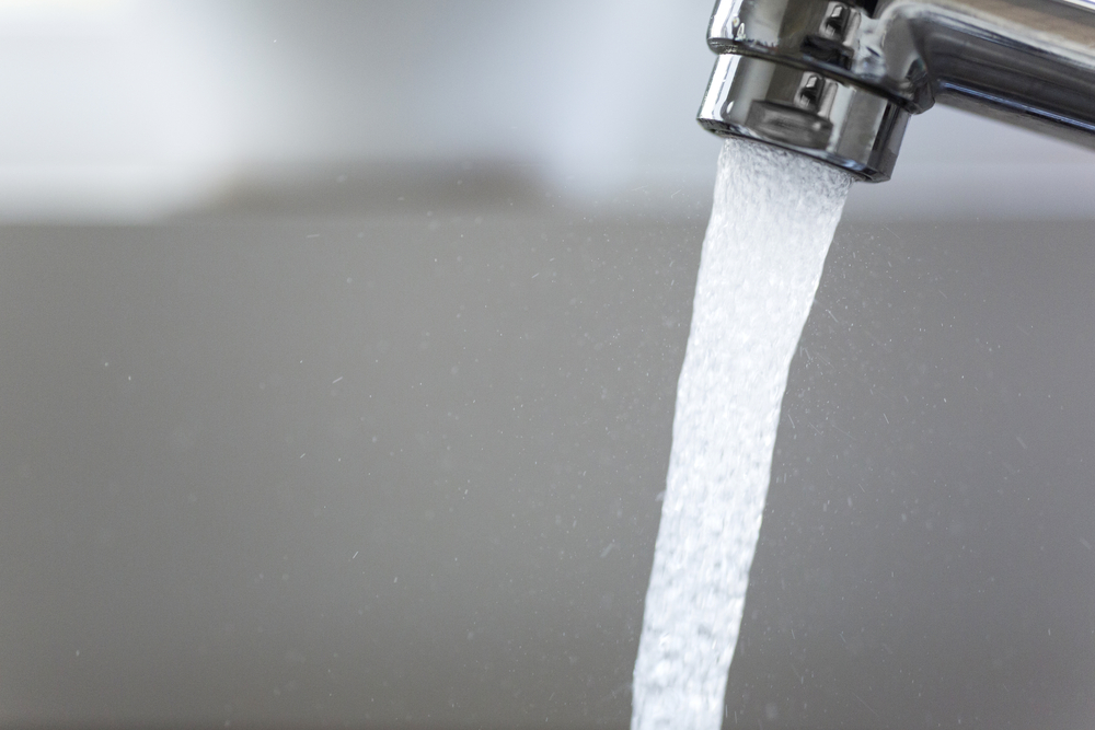 Clean water running out of a faucet